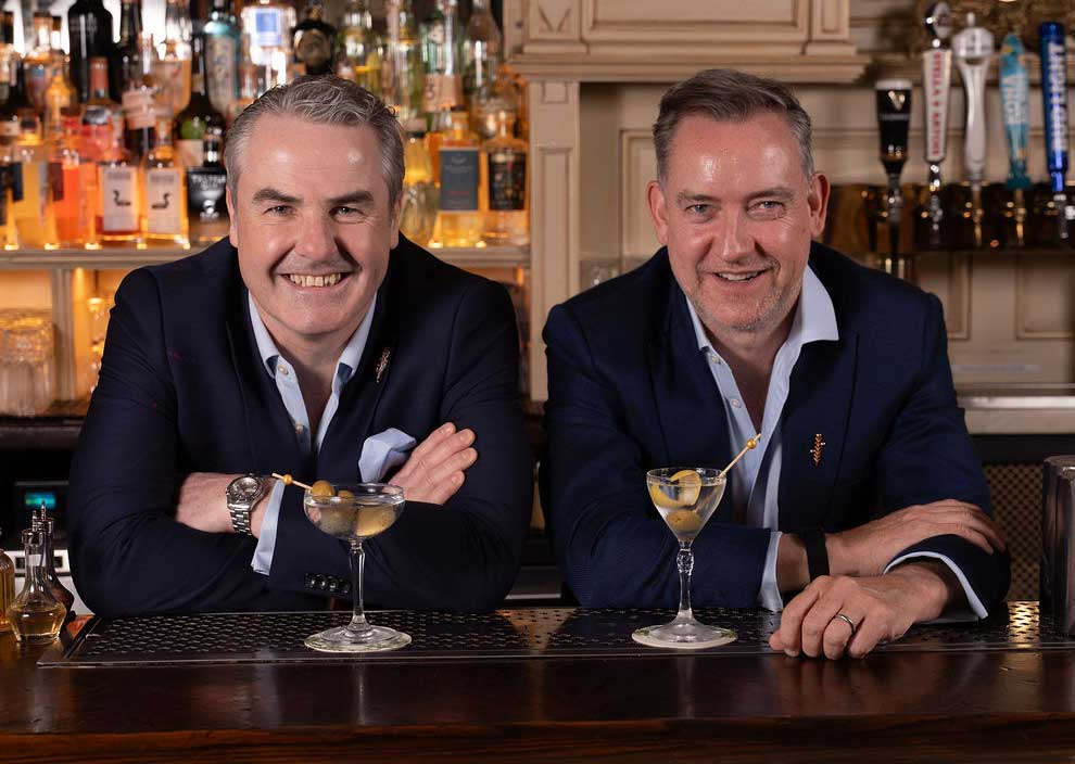 portrait of Philip Duff and Karl Finegan sitting at a bar